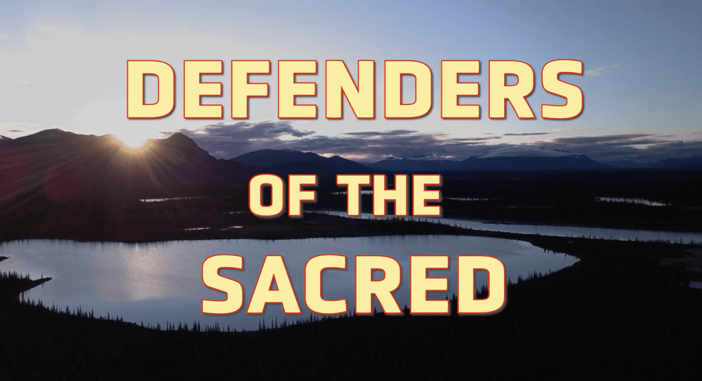 Arial view of the lands of Vashraii Koo (Arctic Village) with text "Defenders of the Sacred"