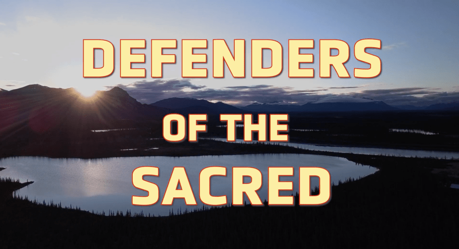 Arial view of the lands of Vashraii Koo (Arctic Village) with text "Defenders of the Sacred"